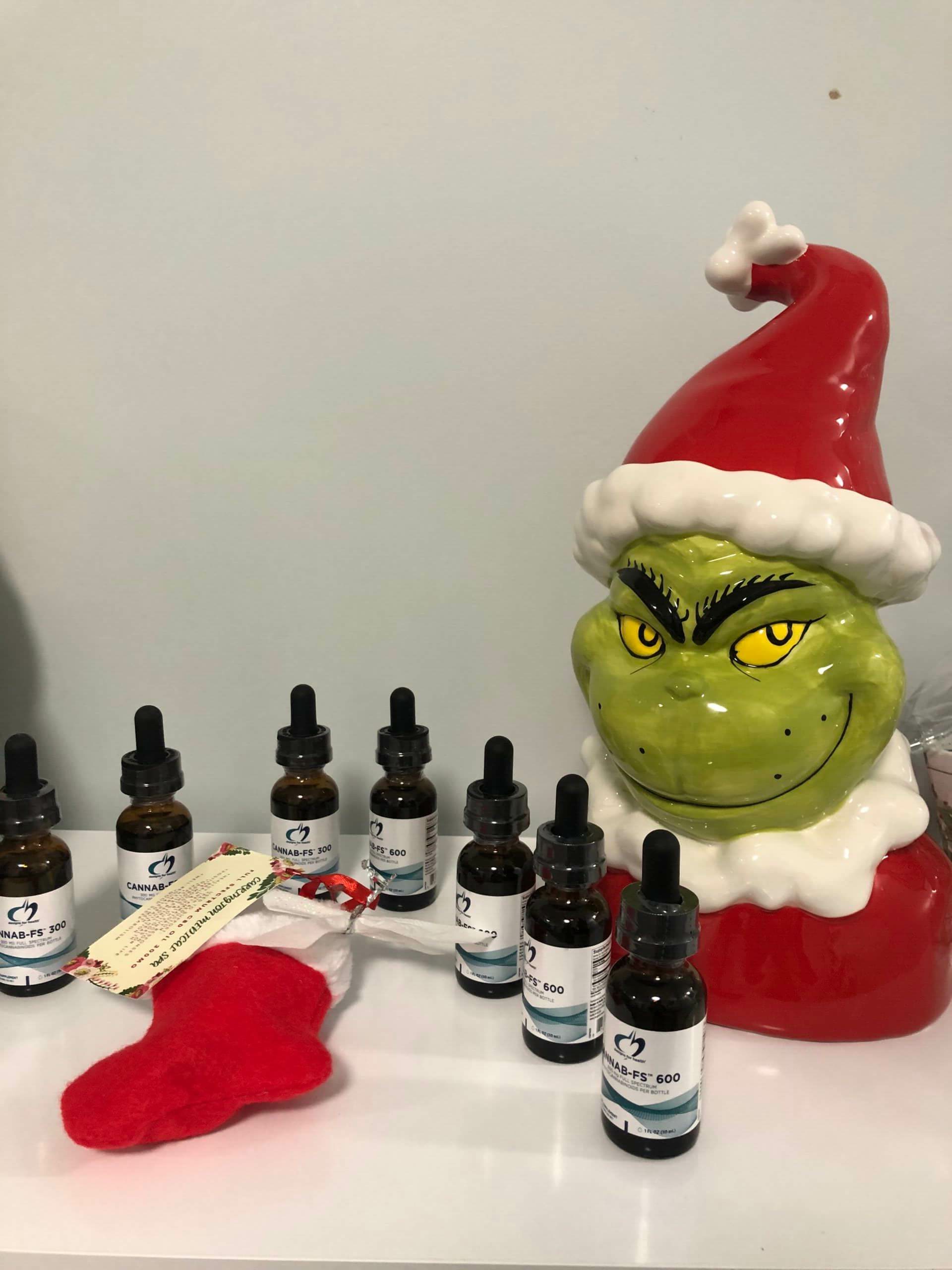 essential oils with the grinch décor